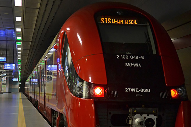 A red underground train heading west towards unlimited potential