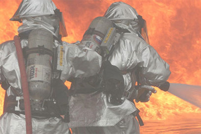 Fire fighters in action representing high-pressure pumps for fire fighting by Danfoss