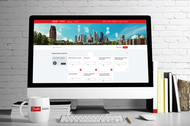 Danfoss Learning portal live on a computer screen in a minimalist desk