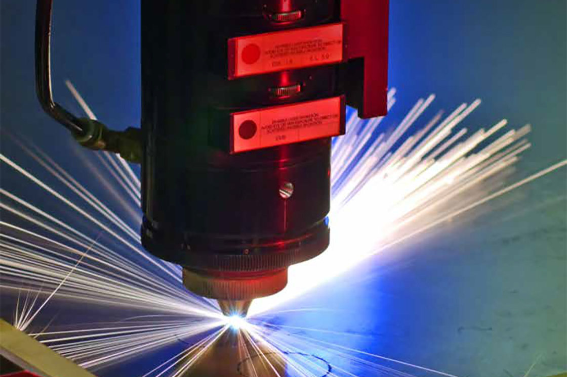 A piece of machinery creating a dramatic lighting effect when it touches another piece of machinery