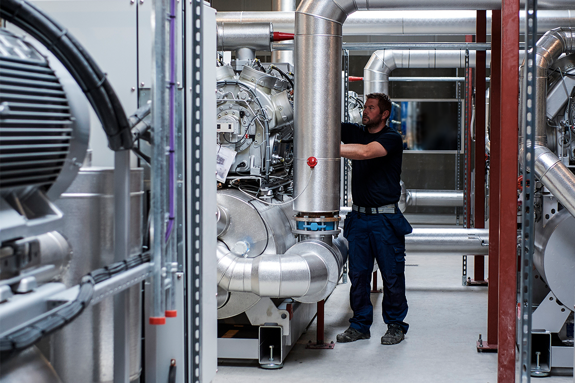 Man working with a heating system 