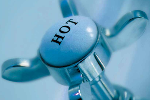 Cost considerations on storage tank versus heat exchanger for hot water preparation