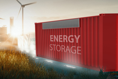 Energy storage container and windmills in the background