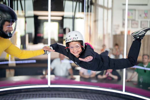 Boy flying in the wind tunnel