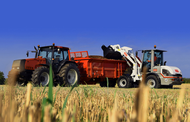 Agriculture machines working on a field