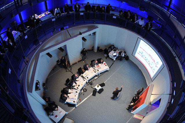 Danfoss employees presenting their business idea at the internal idea competition Man on the Moon.