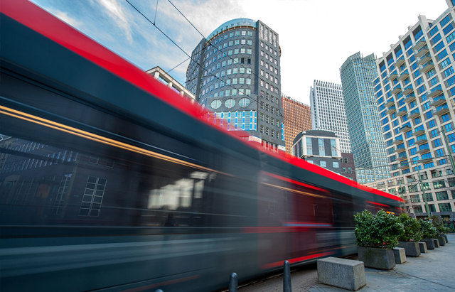 High speed transportation zooming back a city center representing automotive