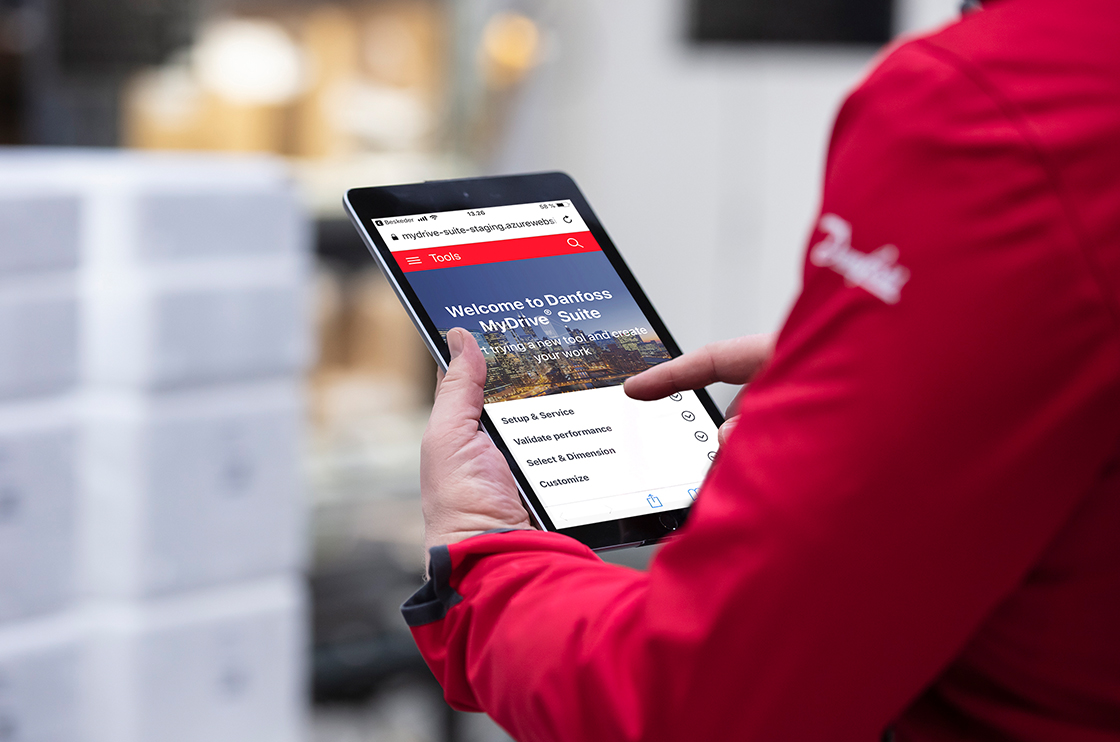 Man using MyDrive Suite on a tablet