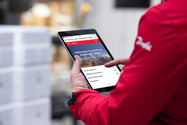 Man using MyDrive Suite on a tablet