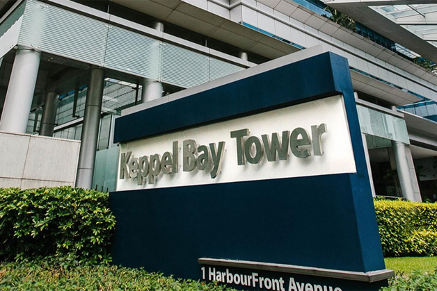 Outside of Keppel Bay Tower, with the text "22.3% reduction in annual energy consumption"