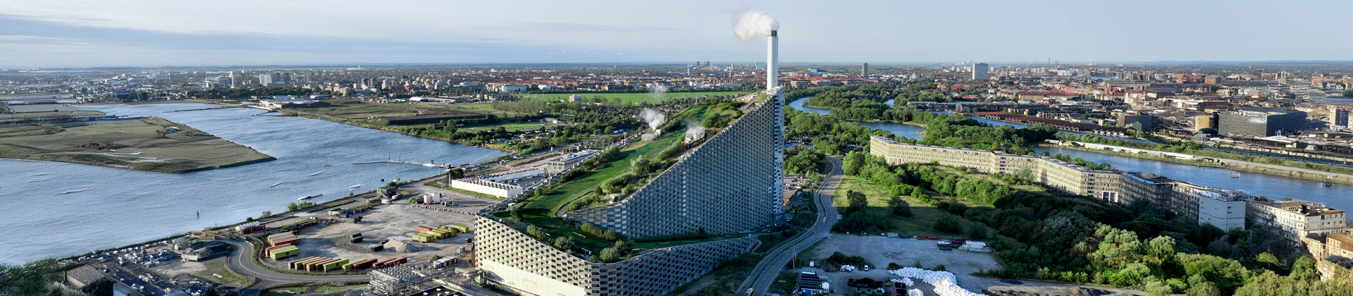 Aerial view of a wastewater plant, with blue lights indicating condition monitoring sensors