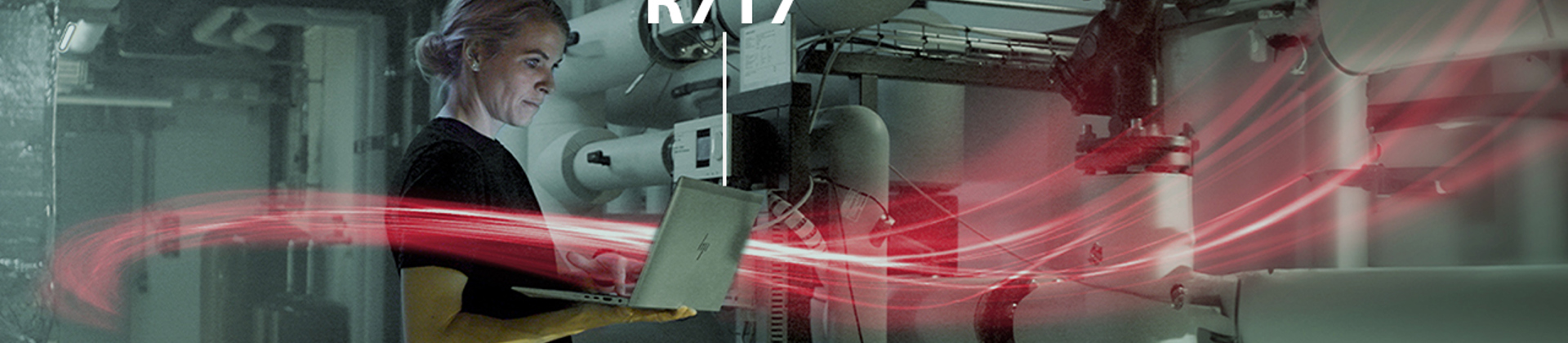 woman holding a laptop with red network visualization