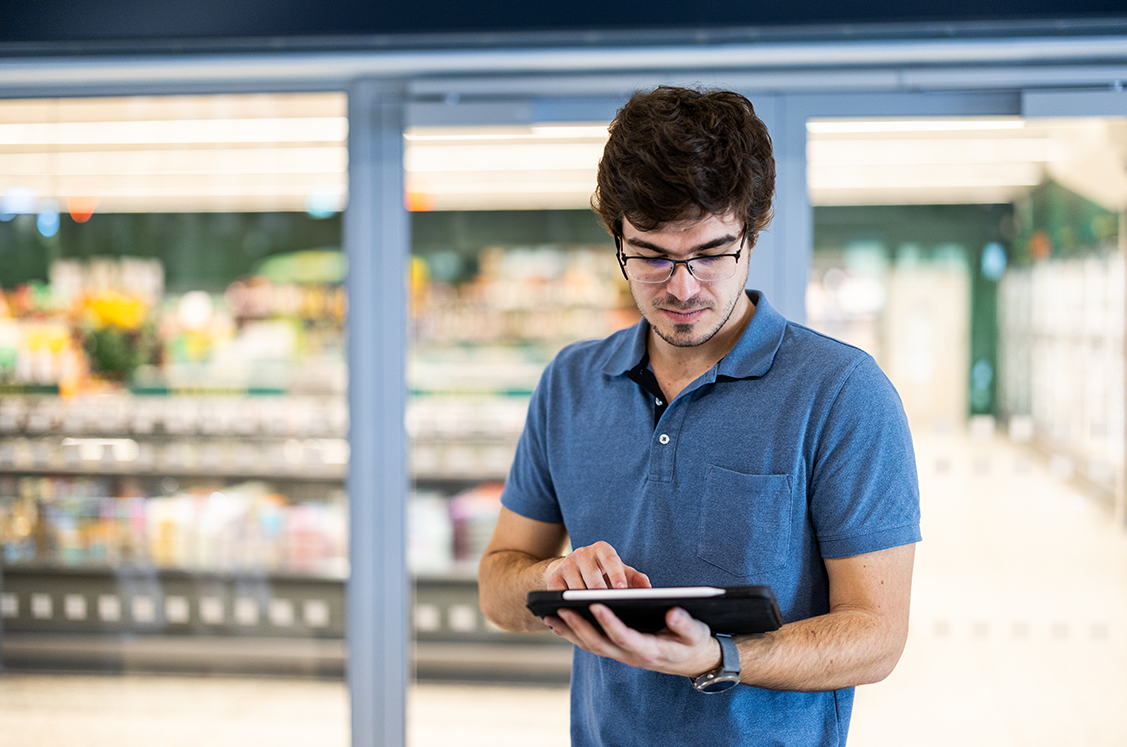 Bird's eye view of road with snow and trees