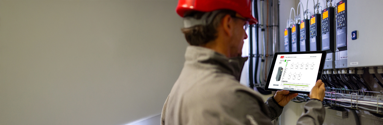 Person gathering spare parts at a Danfoss factory