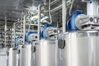 Fire elmotorer omgivet af blå linjer, der angiver tilstandsovervågningssensorer