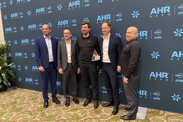 L-R: Vikas Anand, vice president of sales, North America, Danfoss Climate Solutions; Kristian Strand, president, Danfoss Commercial Compressors; Manuel Froeschle, head of product management, BOCK; Ralf Havermann, head of Danfoss BOCK; Howell Feig, product line director, BOCK, North America accept the Innovation Award in the Refrigeration category for the BOCK HGX56 CO2 T compressor.