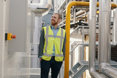 Ivan Rangelov, Industrial Heat Pump Manager in Danfoss Climate Solutions, standing in production area at Gulpener Brewery