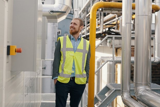 Ivan Rangelov, Industrial Heat Pump Manager in Danfoss Climate Solutions, standing in production area at Gulpener Brewery