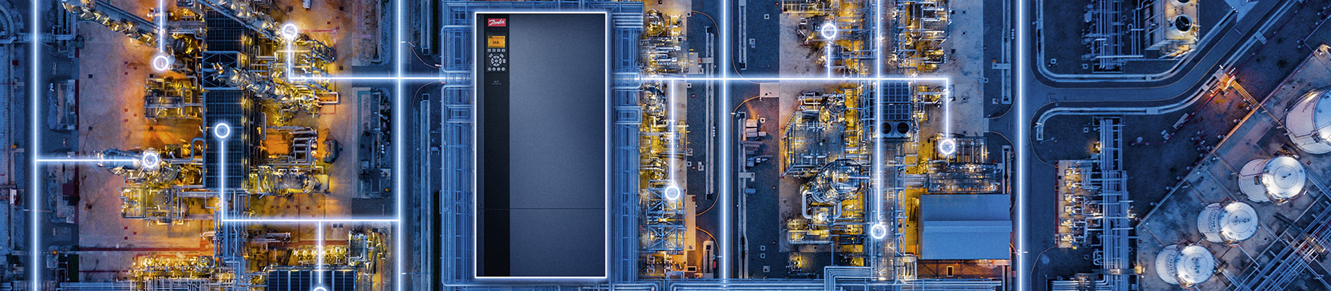 A Danfoss drive shown above a chemical plant