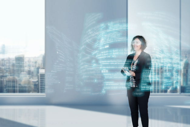 A woman who stands and work on software code