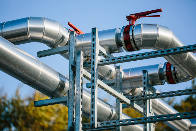 Data centers by reusing surplus heat