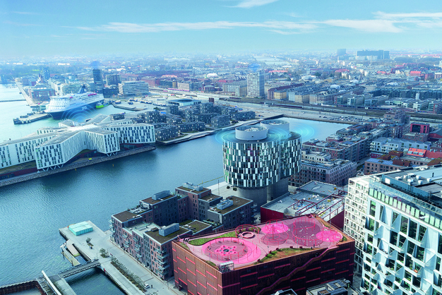 Kööpenhaminan Nordhavnista otettu ilmakuva, jossa kunnonvalvontasignaali näkyy useiden rakennusten päällä