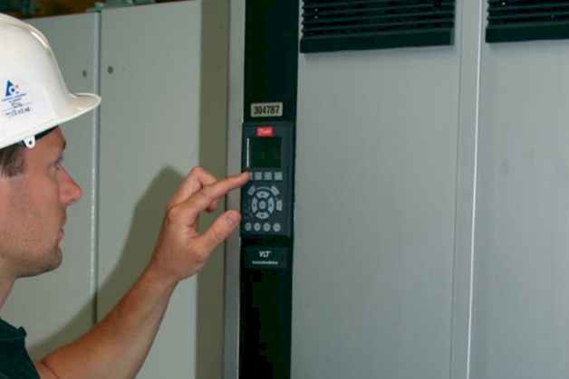 Man adjusting the drives settings