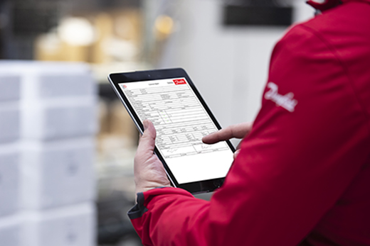 DrivePro Service person looking at an Ipad with information
