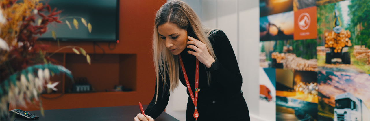 Former Office trainee writing notes