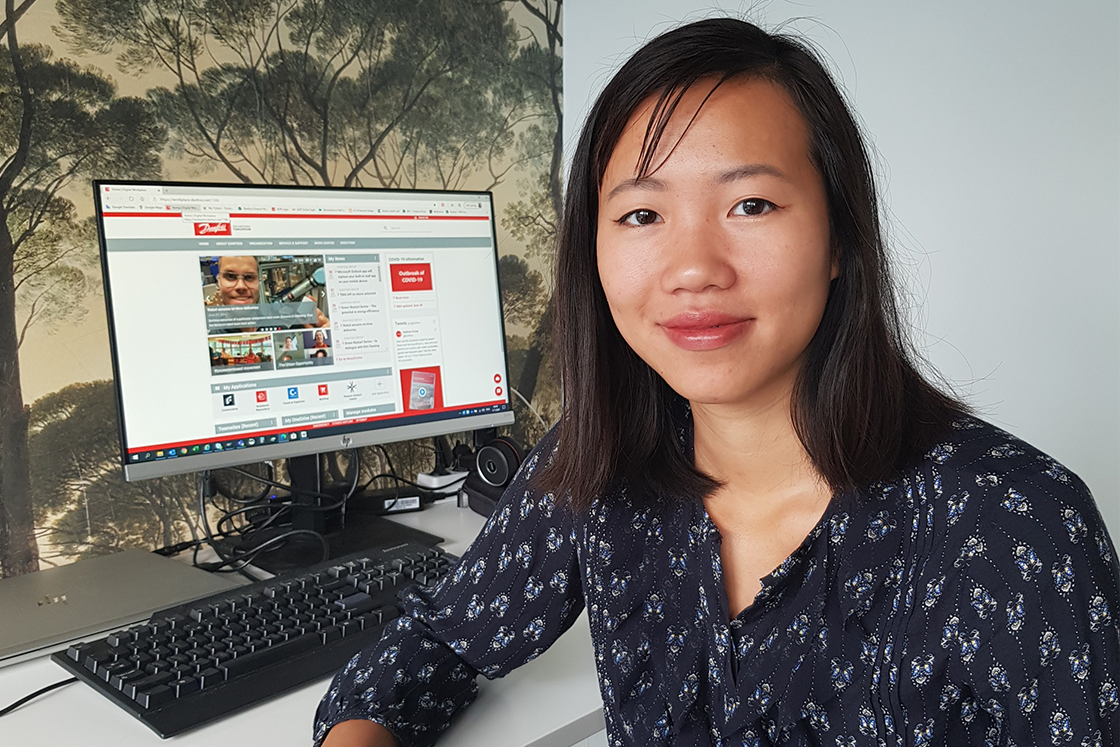 Anna sitting at her working desk